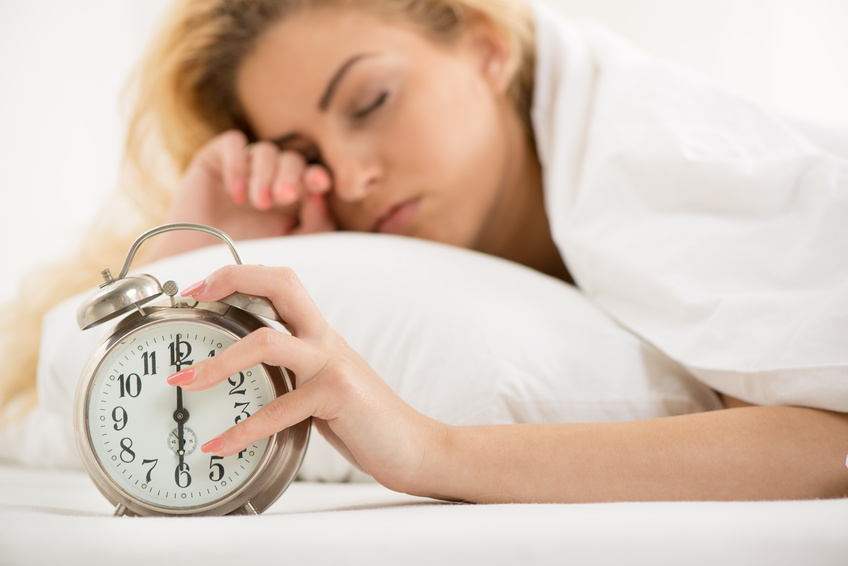 woman with sleep apnea wakes up groggy and feeling sleep deprived