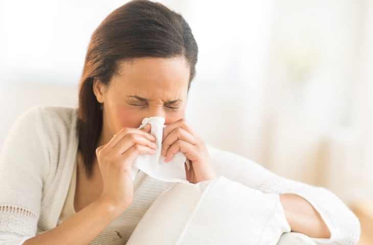 woman suffering from nasal congestion